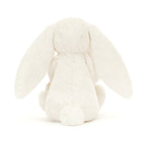 Lapin avec une canne à sucre