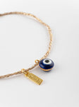 Bracelet corde dorée Oeil bleu - Nach