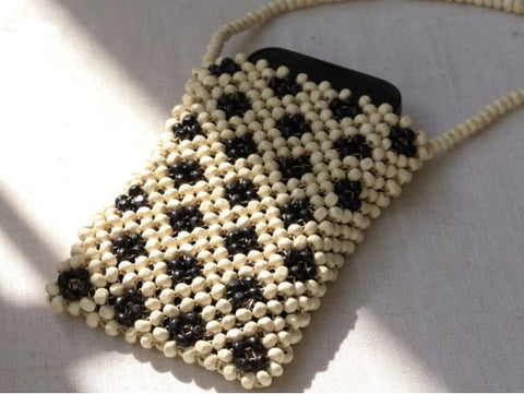 Pochette en perle sale