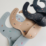Bavoir silicone mushie - Rocket fusée