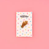 Pin's Premier calin noir -  Coucou Suzette